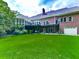 Large, level backyard with a deck and patio, perfect for outdoor entertaining at 275 Frances Rd, Canton, GA 30114