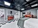 Bedroom features a unique dark ceiling, gray walls, and black and white checkered flooring at 275 Frances Rd, Canton, GA 30114