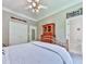 Bedroom with neutral walls, plush carpet, ceiling fan and an en suite bathroom at 275 Frances Rd, Canton, GA 30114