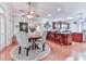 Charming breakfast nook features round table, hardwood floors, and natural light from large windows at 275 Frances Rd, Canton, GA 30114