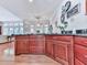 Spacious eat-in kitchen with wood floors, a center island, and stainless steel appliances at 275 Frances Rd, Canton, GA 30114