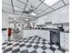 Well appointed kitchen featuring white cabinetry, a breakfast bar, and seamless access to the living area at 275 Frances Rd, Canton, GA 30114