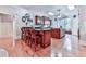Spacious kitchen with wooden cabinets, granite countertops, an island with seating and a cozy breakfast nook at 275 Frances Rd, Canton, GA 30114