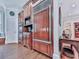 Close up of the kitchen cabinets with stainless steel refrigerator and built-in microwave at 275 Frances Rd, Canton, GA 30114