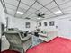 Cozy living area with comfortable seating, plush carpeting, and a sleek TV for entertainment at 275 Frances Rd, Canton, GA 30114