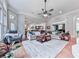 Bright living room featuring neutral furniture, hardwood floors and an open floorplan to kitchen and dining at 275 Frances Rd, Canton, GA 30114