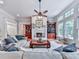 Cozy living room featuring a fireplace and large windows creates a bright and inviting space for relaxation and entertainment at 275 Frances Rd, Canton, GA 30114