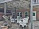 Outdoor patio with wicker furniture, ideal for relaxing and enjoying the garden at 275 Frances Rd, Canton, GA 30114