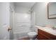 Bathroom featuring a bath tub and shower combo, toilet, and single vanity at 5859 Bellingrath Way, Lithonia, GA 30058
