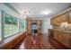 Modern kitchen with stainless steel appliances, wooden cabinets, and hardwood flooring at 5859 Bellingrath Way, Lithonia, GA 30058