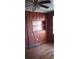 Bedroom features wood paneling, built in shelves, ceiling fan and hardwood floors at 637 Ferris St, Atlanta, GA 30310