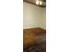Bedroom has damaged hardwood floors, off-white walls and a decorative ceiling border at 637 Ferris St, Atlanta, GA 30310