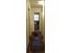 Hallway leading to the bathroom, hardwood floors are damaged at 637 Ferris St, Atlanta, GA 30310