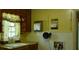 Kitchen with wood cabinets, a stainless steel sink, and a vintage-style appliance at 637 Ferris St, Atlanta, GA 30310