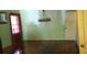 The Living Room features hardwood floors, a window with red curtains, and an old chandelier at 637 Ferris St, Atlanta, GA 30310