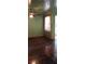 Spacious living room with hardwood floors, neutral paint, and a window to let light in at 637 Ferris St, Atlanta, GA 30310