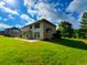 Large grassy backyard with plenty of space for outdoor activities and relaxation at 842 Treeline Dr, Conyers, GA 30016