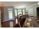 Bright dining area with a large window view and stylish furnishings at 842 Treeline Dr, Conyers, GA 30016