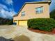 Spacious three car garage provides ample parking, with a large driveway at 842 Treeline Dr, Conyers, GA 30016