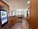 Well-equipped kitchen with stainless steel appliances, granite countertops and open dining area at 842 Treeline Dr, Conyers, GA 30016