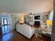 Living room showcases hardwood floors and plenty of natural light at 842 Treeline Dr, Conyers, GA 30016