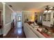 Open-concept living area with hardwood floors, a comfortable sofa, and natural light at 842 Treeline Dr, Conyers, GA 30016
