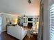 Bright living room featuring hardwood floors, and built-in shelves at 842 Treeline Dr, Conyers, GA 30016