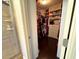 Bright walk-in closet with abundant storage, built-in drawers, and well-organized clothing racks at 842 Treeline Dr, Conyers, GA 30016