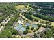 Aerial view showing community features including pool, tennis courts, and a golf course at 960 River Valley Dr, Dacula, GA 30019