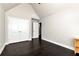 An empty bedroom with hard wood floors and neutral colored walls at 960 River Valley Dr, Dacula, GA 30019