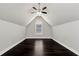 Spacious bonus room with vaulted ceilings, hardwood floors and a ceiling fan at 960 River Valley Dr, Dacula, GA 30019