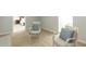 Attic sitting room featuring neutral paint and furniture and plush carpet at 120 Kettering Trce, Tyrone, GA 30290