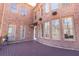 Wooden deck that backs up to a brick house with many windows at 120 Kettering Trce, Tyrone, GA 30290