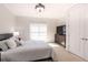 Light and bright bedroom with neutral carpet, ceiling fan, and view of the window at 120 Kettering Trce, Tyrone, GA 30290