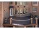 Beautiful brick home with a spacious deck and wrought iron railing at 120 Kettering Trce, Tyrone, GA 30290