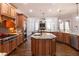 Well-appointed kitchen with a center island, stainless steel appliances, and an open layout at 120 Kettering Trce, Tyrone, GA 30290