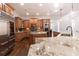 Expansive kitchen featuring custom cabinetry and stainless steel appliances at 120 Kettering Trce, Tyrone, GA 30290