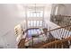 Bright, open floor plan living room from above showcases fireplace and windows at 120 Kettering Trce, Tyrone, GA 30290