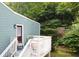 Home's cozy backyard deck is the perfect place to relax and enjoy nature at 1482 Andrews Nw St, Atlanta, GA 30314