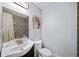 Bright bathroom features a modern vanity, toilet, and decorative tile, complete with modern fixtures and a serene atmosphere at 1482 Andrews Nw St, Atlanta, GA 30314