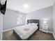 Inviting bedroom with neutral walls, carpet, and a comfortable bed, creating a relaxing and peaceful sanctuary at 1482 Andrews Nw St, Atlanta, GA 30314