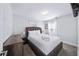 Comfortable bedroom with a plush bed, soft carpet, and neutral walls creating a relaxing and inviting atmosphere at 1482 Andrews Nw St, Atlanta, GA 30314