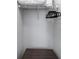Storage closet featuring a wire rack shelf and dark colored hangers at 1482 Andrews Nw St, Atlanta, GA 30314