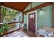 Inviting front porch with seating, plants, and a welcoming entrance to the home at 1482 Andrews Nw St, Atlanta, GA 30314