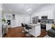 Modern kitchen with a granite island, stainless steel appliances, and hardwood floors at 1482 Andrews Nw St, Atlanta, GA 30314