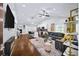 Open-concept living room with hardwood floors, modern decor, and abundant natural light at 1482 Andrews Nw St, Atlanta, GA 30314