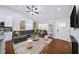 Comfortable living room with a large sectional sofa, fireplace, and stylish accents at 1482 Andrews Nw St, Atlanta, GA 30314