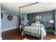 Comfortable bedroom with wooden floors and a queen bed frame at 375 Ralph Mcgill Ne Blvd # 1701, Atlanta, GA 30312