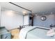 Spacious bedroom featuring a queen bed, large wardrobe, and a cozy sofa at 375 Ralph Mcgill Ne Blvd # 1701, Atlanta, GA 30312