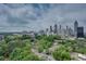 Overlooking trees with a stunning view of city buildings and skyline at 375 Ralph Mcgill Ne Blvd # 1701, Atlanta, GA 30312